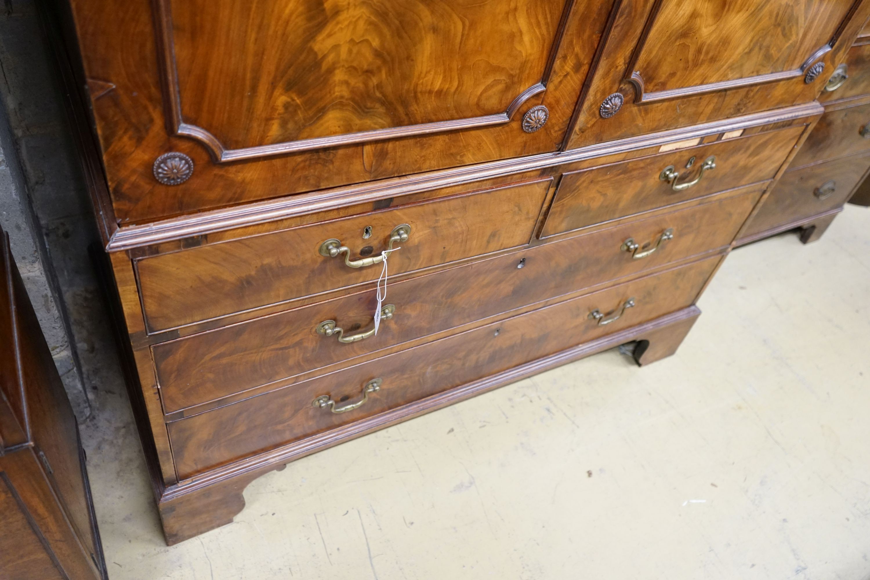 A George III mahogany linen press, width 123cm, depth 60cm, height 198cm